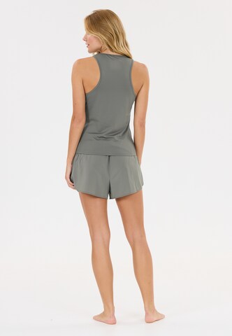 Athlecia Sports top 'Almi V2' in Green