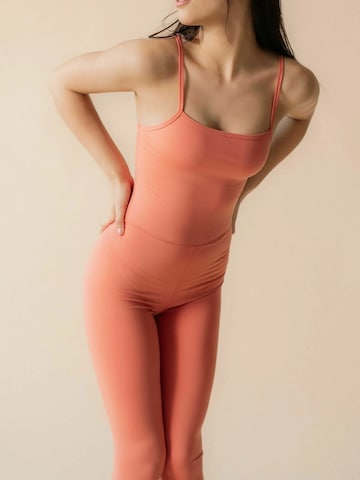 Survêtements 'The Unitard' Girlfriend Collective en rose