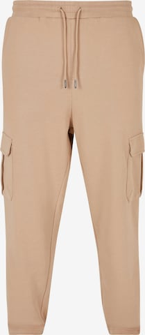 Urban Classics Loose fit Cargo Pants in Beige: front