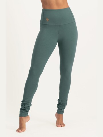 Urban Goddess Yoga & Activewear Slim fit Leggings 'Gaia Yoga & Pilates' in Green: front