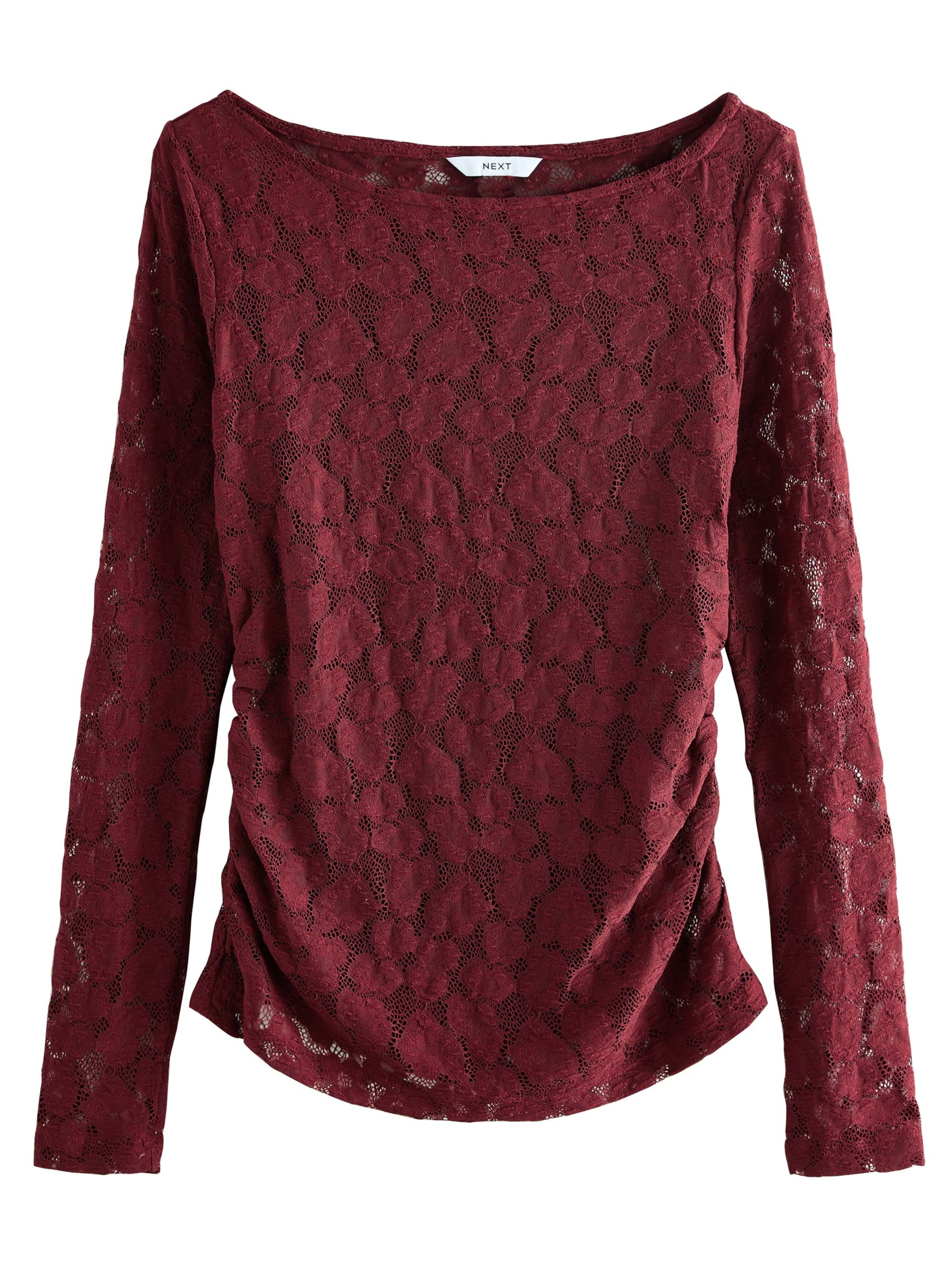 Tricou de la Next pe roșu: față