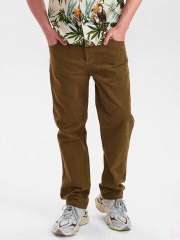 Dxnmxrk Loosefit Hose 'DXElton' in Grün: Vorderseite