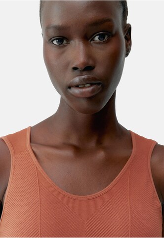 Born Living Yoga Top 'Annapurna' in Orange