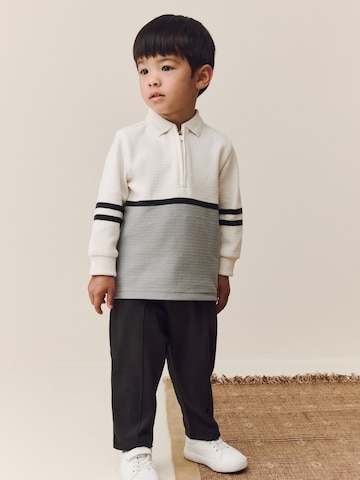 Set Next en gris : devant