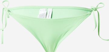 Slip costum de baie de la Calvin Klein Swimwear pe verde: față