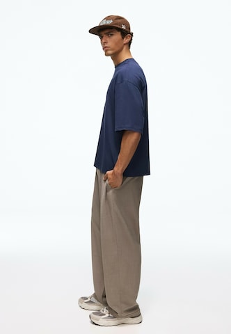 Bershka Baggy Pleat-Front Pants in Beige