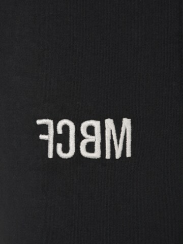 Tapered Pantaloni 'Hans' di FCBM in nero