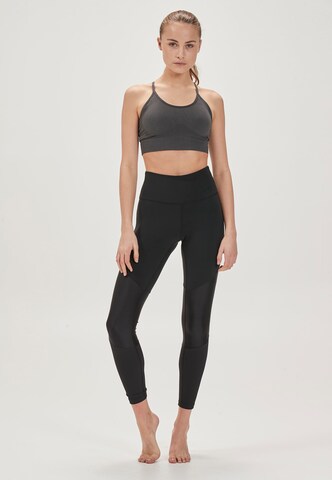 Athlecia Slim fit Sports trousers 'Melasa' in Black
