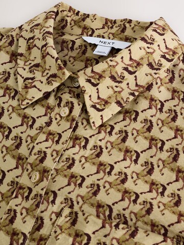 Next Pusero värissä beige