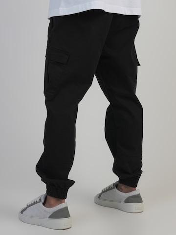 Effilé Pantalon cargo SikSilk en noir