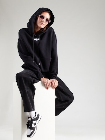 Sweat-shirt 'PHNX FLC' Nike Sportswear en noir