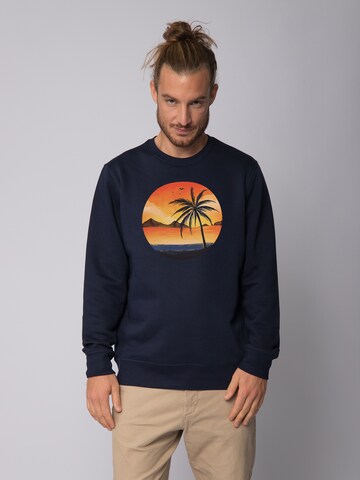 Felpa ' Sunset on palm beach ' di Watapparel in blu: frontale