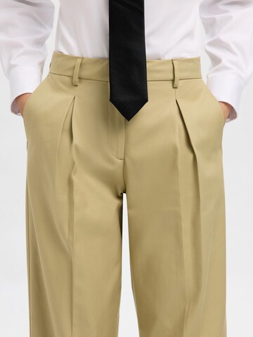 Tapered Pantaloni con pieghe di SELECTED in verde