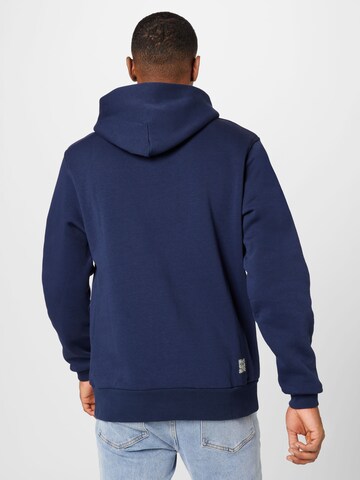 Champion Authentic Athletic Apparel Sweatshirt i blå