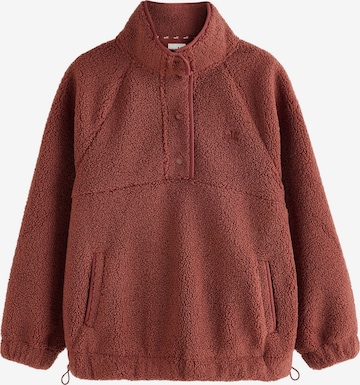Pull-over self. en marron : devant