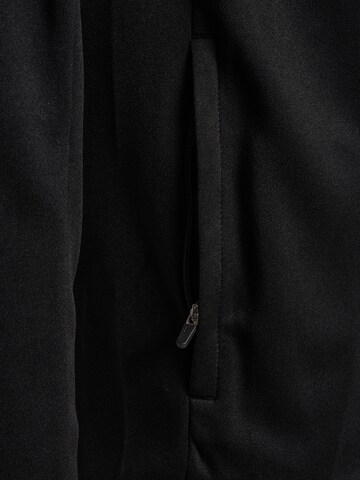 Veste de survêtement Hummel en noir