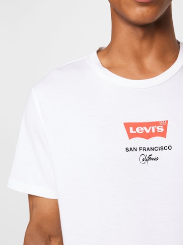 LEVI'S ® Regular Paita 'Housemark Graphic Tee' värissä valkoinen