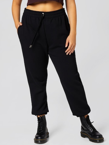 Tapered Pantaloni 'Ida' de la A LOT LESS pe negru: față