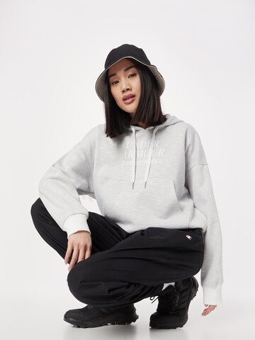 UNDER ARMOUR Sports sweatshirt 'Essential' in White