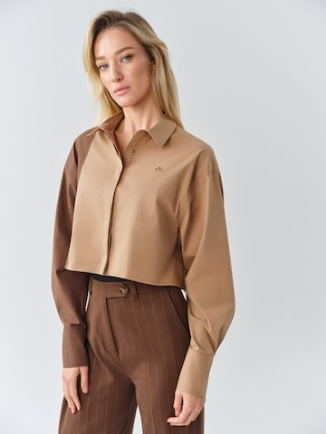 MB by Marta Buzolic - Blusa funcional en beige