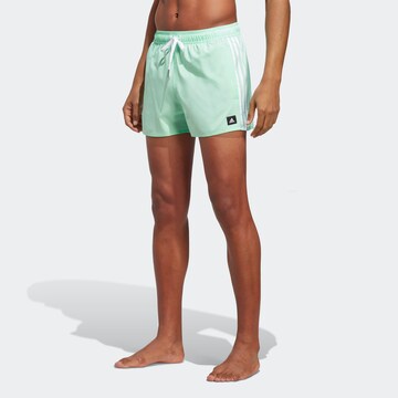 ADIDAS SPORTSWEAR Athletic Swim Trunks in Green: front