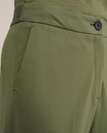 WE Fashion Bootcut Pantalon in Groen