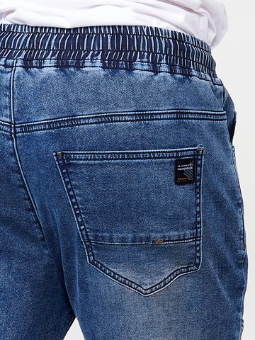 KOROSHI Tapered Jeans in Blue