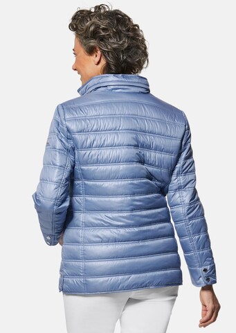 Goldner Jacke in Blau