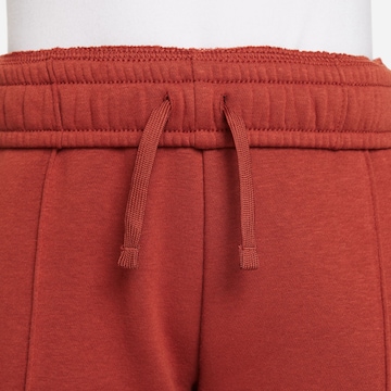 Nike Sportswear Tapered Pants in Red