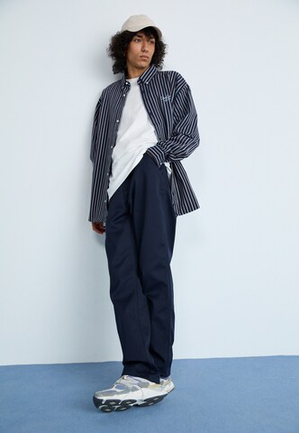 Carhartt WIP Свободный крой Штаны в Синий