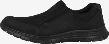 Rieker Slip-Ons in Black