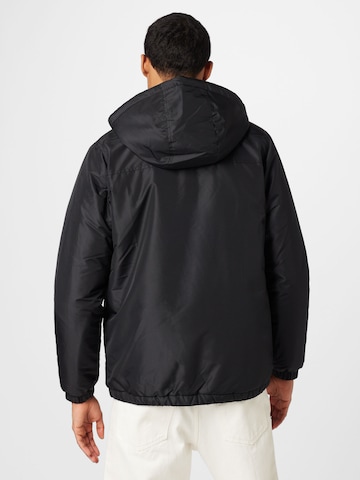 ELLESSE Between-Season Jacket in Black