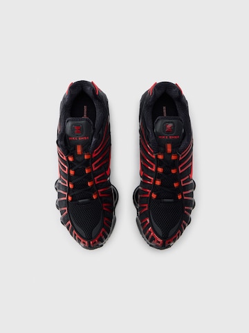 Baskets basses 'Shox TL' Nike Sportswear en noir