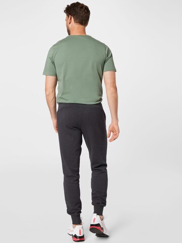 PUMA Tapered Sportbroek in Grijs