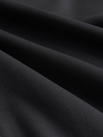 Skinny Leggings di Next in nero