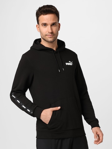 PUMA Sportsweatshirt 'Ess+' in Schwarz: predná strana