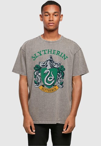 ABSOLUTE CULT Shirt 'Harry Potter - Slytherin Crest' in Grijs: voorkant
