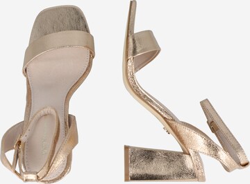 TATA Italia Páskové sandály – zlatá