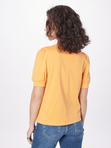 Maglietta 'VMKerry' di Aware in arancione