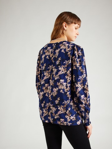 Claire - Blusa 'Roda' en azul