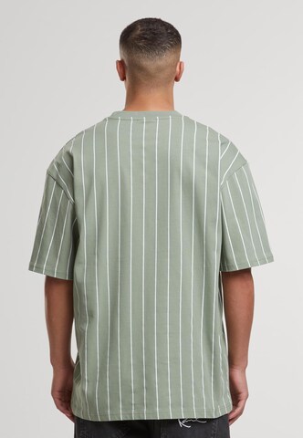 Karl Kani T-Shirt 'Small Signature Essential' in Grün