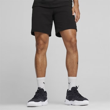 Regular Pantalon de sport 'Pivot' PUMA en noir : devant