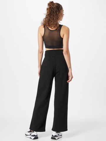 PUMA Wide leg Broek 'Classics' in Zwart