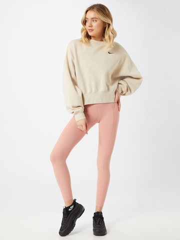 NIKE Skinny Sportovní kalhoty 'Yoga' – pink