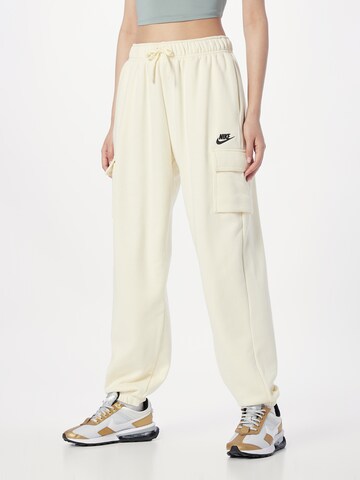 Tapered Pantaloni cu buzunare 'Club Fleece' de la Nike Sportswear pe bej: față