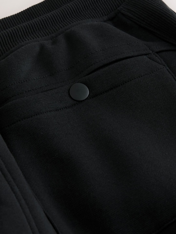 Next Zúžený strih Kapsáče - Čierna