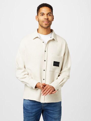 Calvin Klein Jeans Between-Season Jacket in Beige: front