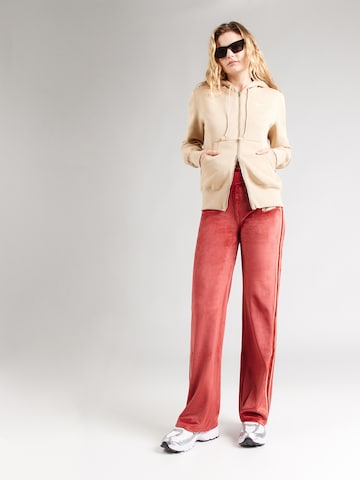 Nike Sportswear Свободный крой Штаны в Оранжевый