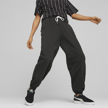 Effilé Pantalon de sport PUMA en noir : devant