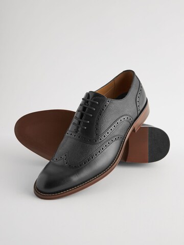 Chaussure à lacets Next en noir
